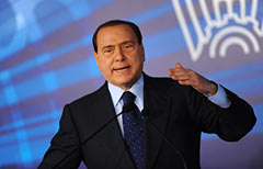 Il presidente del Consiglio Silvio Berlusconi parla all'assemblea di Confindustria a Monza (Afp Photo/Giuseppe Cacace)