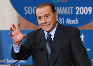 Silvio Berlusconi al termine del vertice G8 dei ministri del welfare (Infophoto)