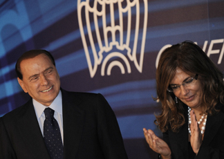 Silvio Berlusconi e Emma Marcegagliaglia (Ansa)