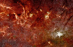 Il cuore della Via Lattea fotografato all’infrarosso da Hubble e da Spitzer