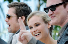 Brad Pitt, Diane Kruger e Quentin Tarantino ieri a a Cannes (AFP)